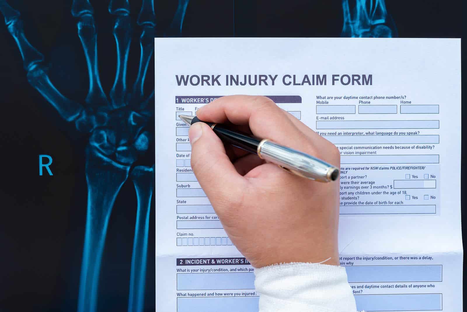 bigstock-Filling-Up-A-Work-Injury-Claim-261780220